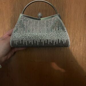 Silver studded clutch.